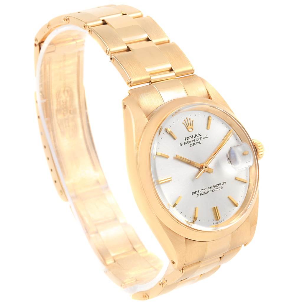 The image shows a Rolex Vintage Collection 1500 Men's Yellow Gold Silver Dial 1500 Men's Yellow Gold Silver Dial model watch at an angled view, highlighting its gold bracelet, dial, and crown.