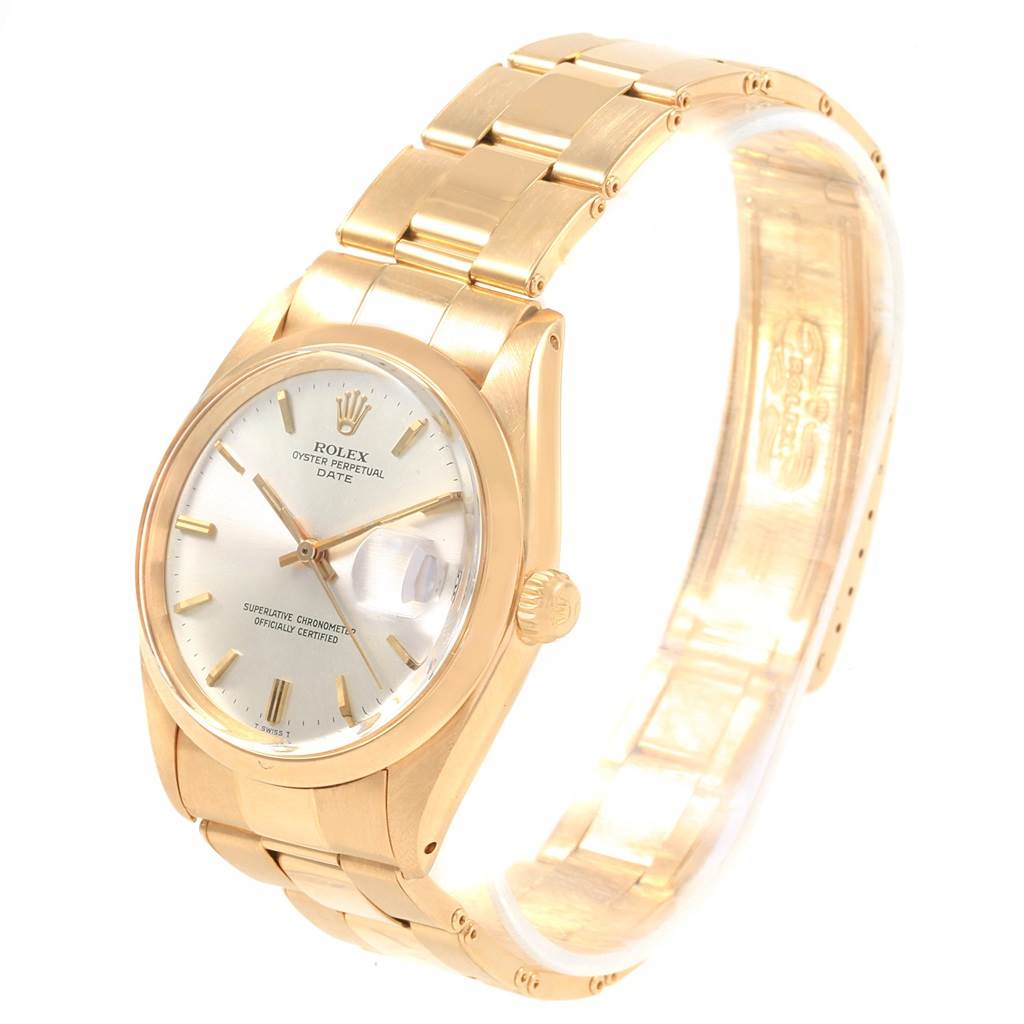 The Rolex Vintage Collection 1500 Men's Yellow Gold Silver Dial 1500 Men's Yellow Gold Silver Dial watch is shown at an angle highlighting the face, bezel, crown, and part of the bracelet.