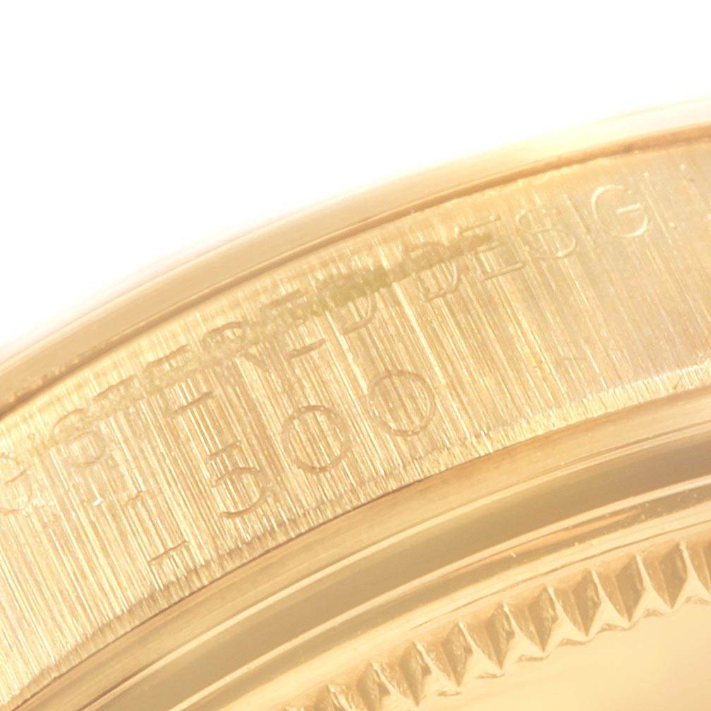 This close-up image shows the textured bezel and serial number engraving on the edge of the Vintage Collection model by Rolex.