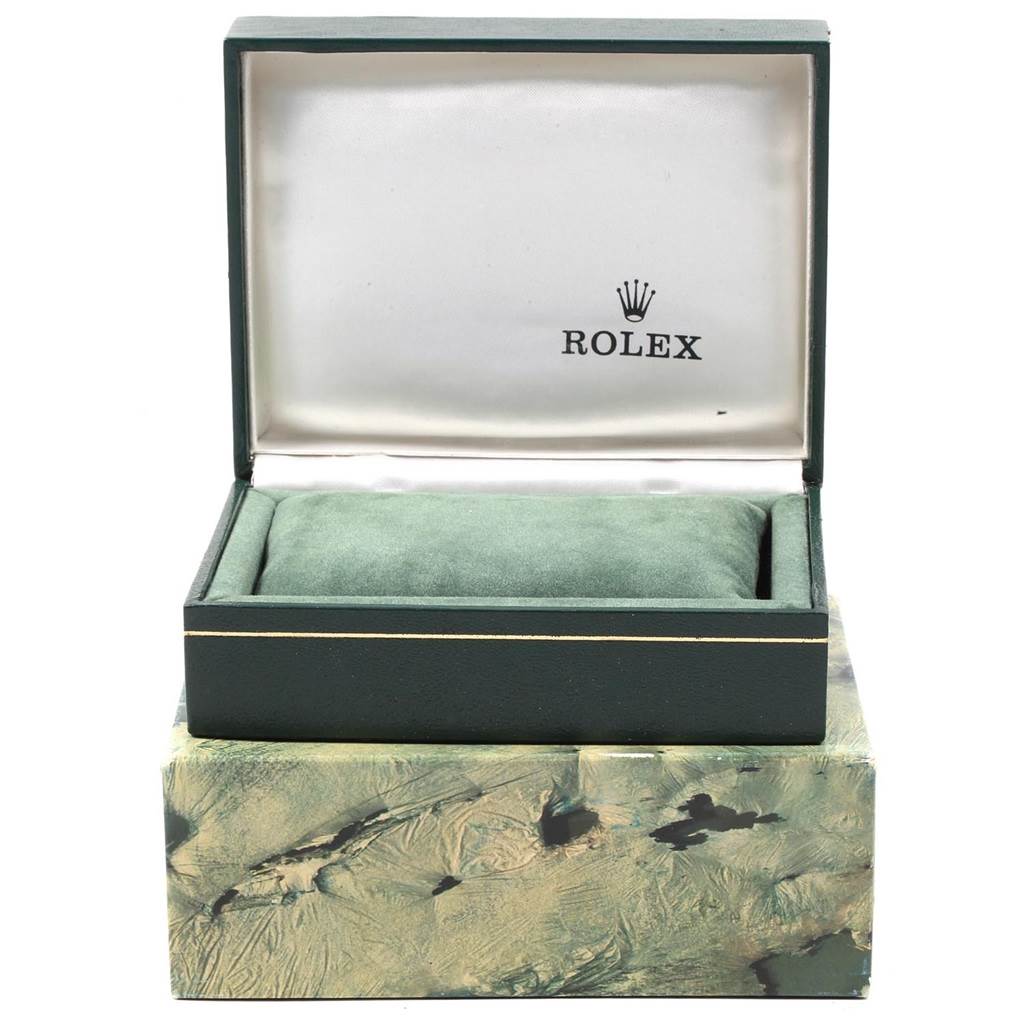 The image shows an open box for a Vintage Collection model by Rolex, displaying its interior and cushion.