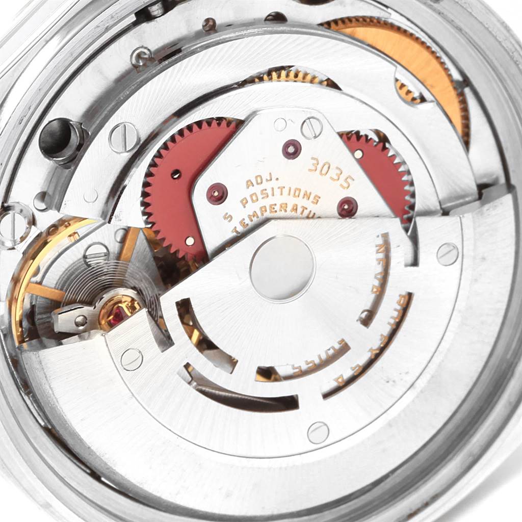 This image shows a close-up view of the movement mechanism inside the Rolex Vintage Collection 16014 Men's Stainless Steel Silver Dial 16014 Men's Stainless Steel Silver Dial watch model.