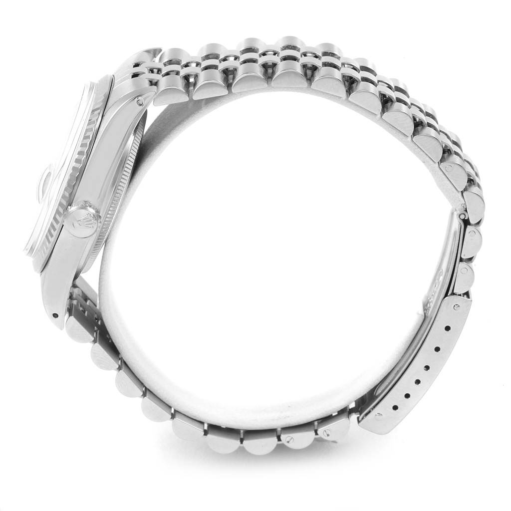 This side view of the Rolex Vintage Collection 16014 Men's Stainless Steel Silver Dial 16014 Men's Stainless Steel Silver Dial watch shows the bracelet and case.