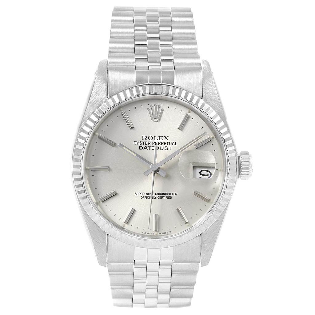 The image shows a front view of a Vintage Collection Rolex Oyster Perpetual Datejust with a silver dial and metal bracelet.