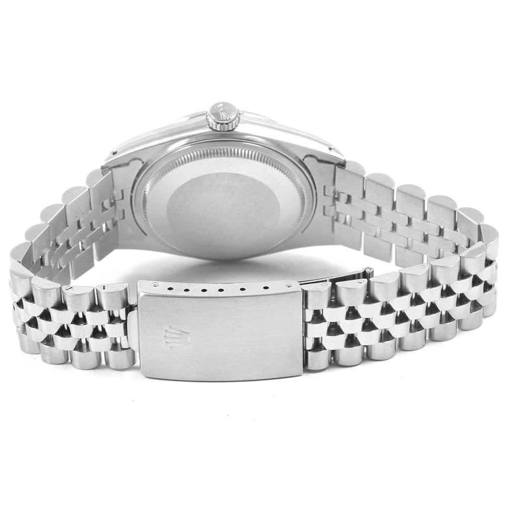 This image shows the back view of a Rolex Vintage Collection 16014 Men's Stainless Steel Silver Dial 16014 Men's Stainless Steel Silver Dial watch, focusing on the case back and metal bracelet with a clasp.