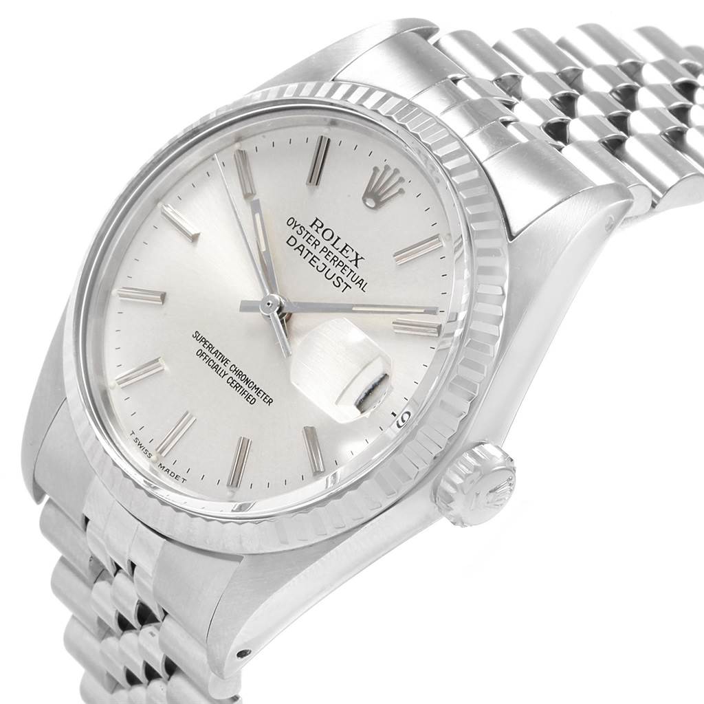 The image shows a partial side-angle view of the Rolex Vintage Collection 16014 Men's Stainless Steel Silver Dial 16014 Men's Stainless Steel Silver Dial Datejust, highlighting the dial, bezel, and bracelet.