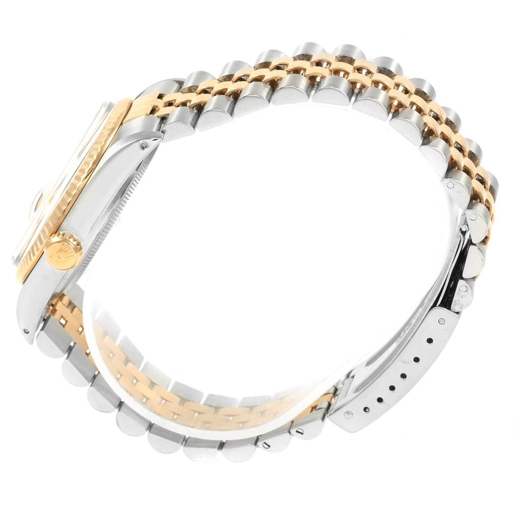 This side view shows the bracelet, clasp, and side of the case with the crown of the Vintage Collection model by Rolex.