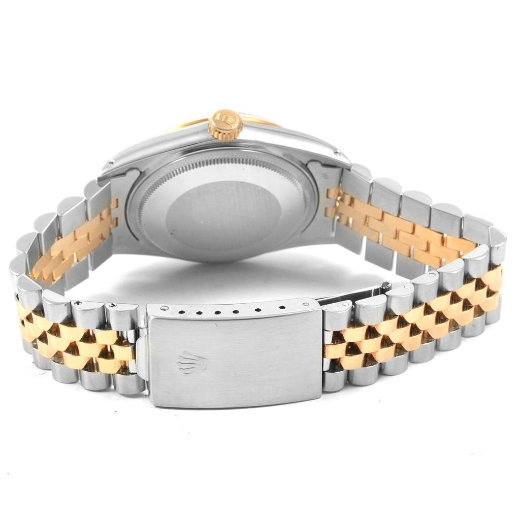 This image shows the back and sides of the Rolex Vintage Collection 16013 Men
s Stainless Steel Champagne Dial 16013 Men
s Stainless Steel Champagne Dial watch, highlighting the case, crown, and two-tone bracelet.