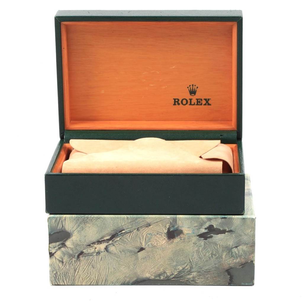 This image displays the box and packaging for a Rolex Vintage Collection 16013 Men
s Stainless Steel Champagne Dial 16013 Men
s Stainless Steel Champagne Dial watch, with the cover open.