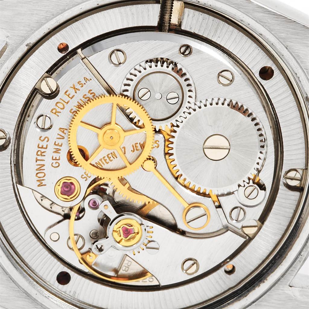 This is a close-up image of the internal mechanical movement of a Vintage Collection Rolex watch.