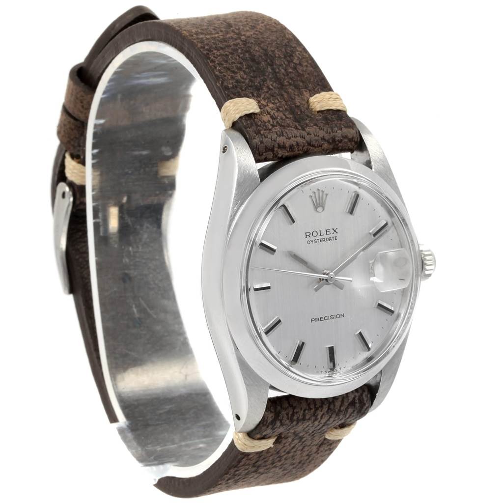 The image shows a Rolex Vintage Collection 6694 Men's Stainless Steel Silver Dial 6694 Men's Stainless Steel Silver Dial model watch from an angled front view, highlighting the dial, case, and brown leather strap.