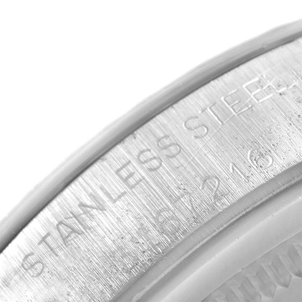 This image shows a close-up of the engraving on the stainless steel case of the Rolex Vintage Collection 6694 Men's Stainless Steel Silver Dial 6694 Men's Stainless Steel Silver Dial watch.