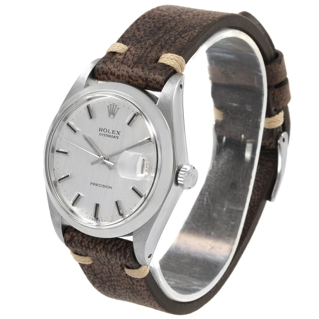 The Rolex Vintage Collection 6694 Men's Stainless Steel Silver Dial 6694 Men's Stainless Steel Silver Dial model is shown from a three-quarter angle, highlighting the watch face, case, and leather strap.