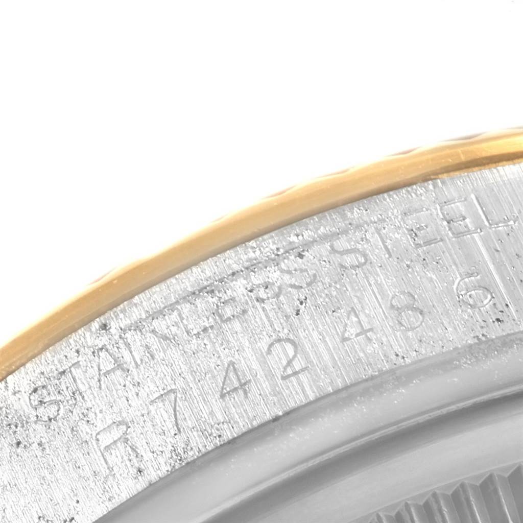 This image shows a close-up of the stainless steel case back of the Rolex Vintage Collection 16013 Men's Stainless Steel Champagne Dial 16013 Men's Stainless Steel Champagne Dial model, highlighting the engraved serial number.