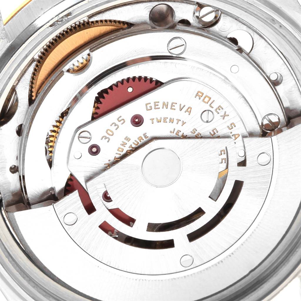 This close-up image shows the intricate internal mechanics of a Rolex Vintage Collection 16013 Men's Stainless Steel Champagne Dial 16013 Men's Stainless Steel Champagne Dial model watch.