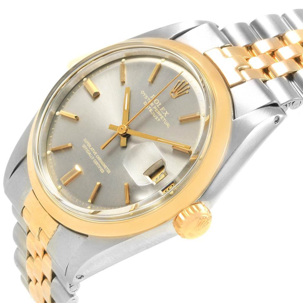 The Rolex Vintage Collection 1601 Men
s Steel and Gold (two tone) Grey Dial 1601 Men
s Steel and Gold (two tone) Grey Dial watch is shown at an oblique angle, highlighting the dial, crown, bezel, and part of the bracelet.