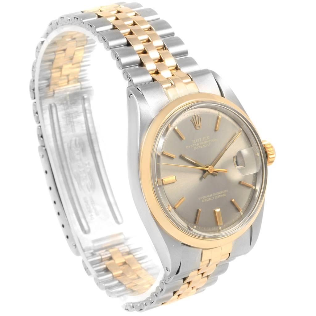 The Rolex Vintage Collection 1601 Men
s Steel and Gold (two tone) Grey Dial 1601 Men
s Steel and Gold (two tone) Grey Dial watch is shown from a front angle, displaying its face, bezel, and bracelet.