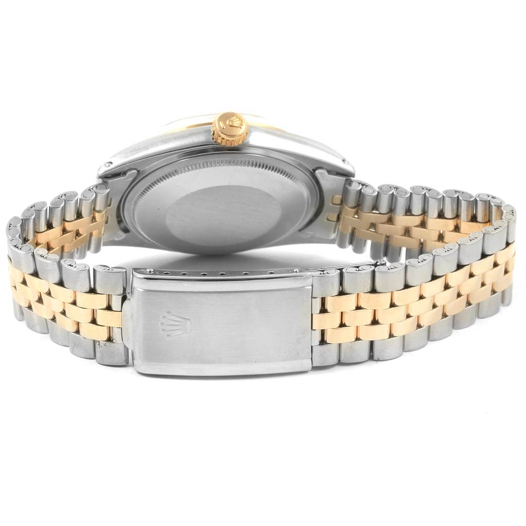 The image shows the back view of a Rolex Vintage Collection 1601 Men
s Steel and Gold (two tone) Grey Dial 1601 Men
s Steel and Gold (two tone) Grey Dial watch, highlighting the two-tone bracelet and clasp.