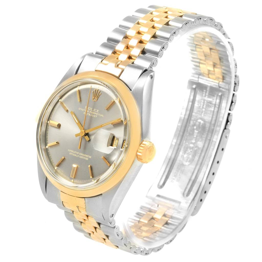 The Rolex Vintage Collection 1601 Men
s Steel and Gold (two tone) Grey Dial 1601 Men
s Steel and Gold (two tone) Grey Dial watch is shown from an angled side view, highlighting its two-tone bracelet, dial, and crown.