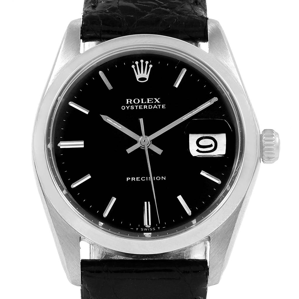 The image shows a frontal view of a Rolex Vintage Collection 6694 Men
s Stainless Steel Black Dial 6694 Men
s Stainless Steel Black Dial Oysterdate watch, highlighting its black dial, date display, and leather strap.