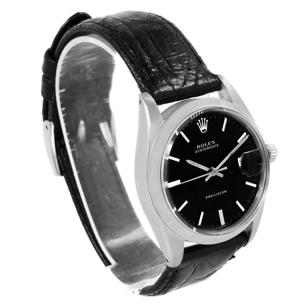 The image shows a side angle of the Rolex Vintage Collection 6694 Men
s Stainless Steel Black Dial 6694 Men
s Stainless Steel Black Dial model, highlighting the black leather strap, dial, and crown.