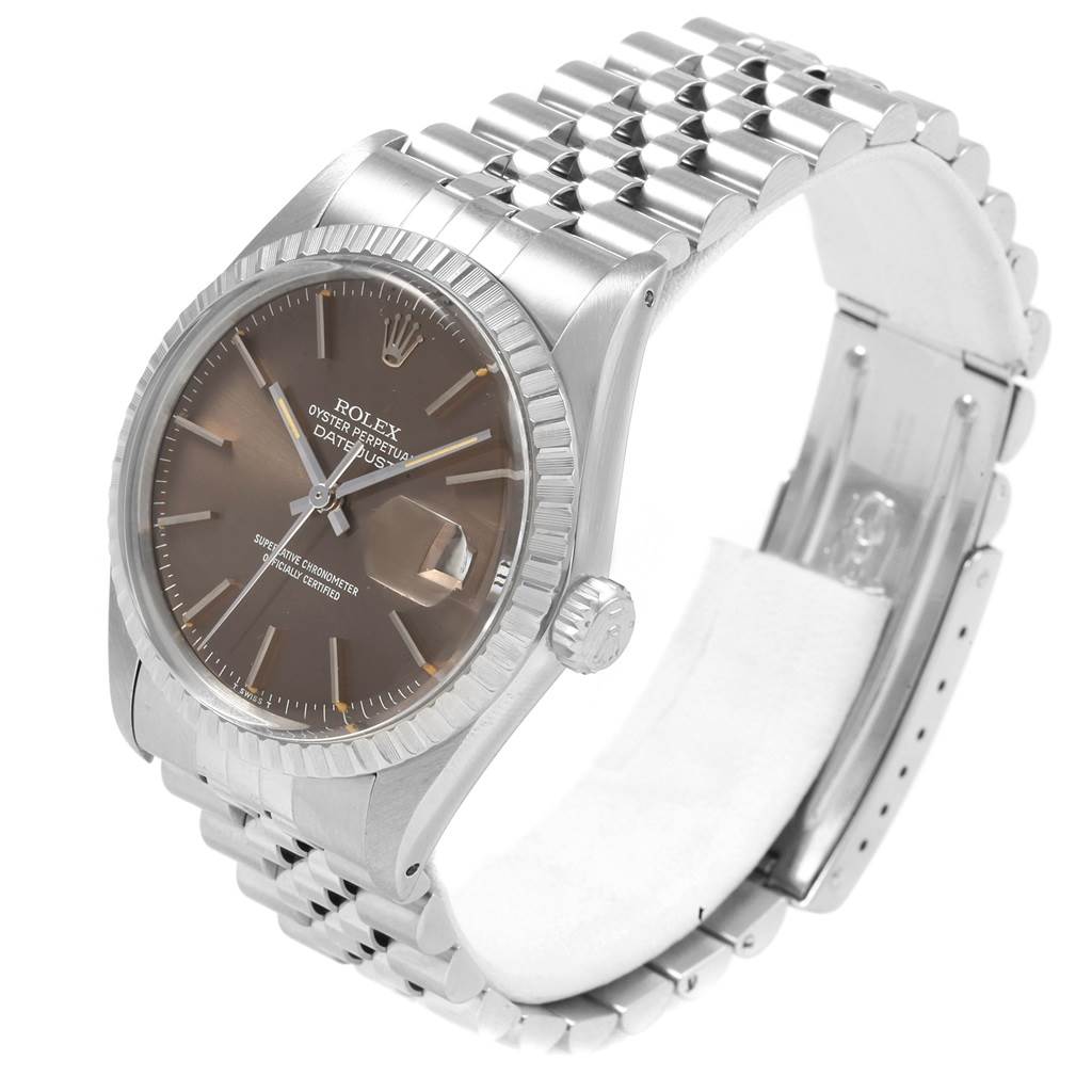 The image shows a Vintage Collection Rolex watch from a three-quarter angle, highlighting the face, bezel, crown, and bracelet.