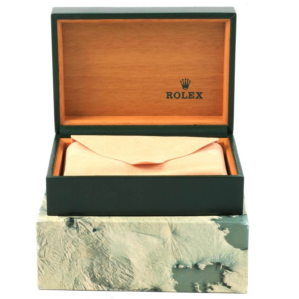 The image shows an open box with a cloth envelope inside for the Vintage Collection model by Rolex, viewed from the front.