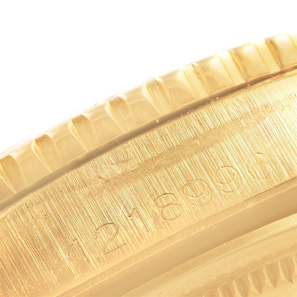 This close-up image shows the edge and serial number engraving on a Rolex Vintage Collection 1625 Men's Yellow Gold Champagne Dial 1625 Men's Yellow Gold Champagne Dial watch.