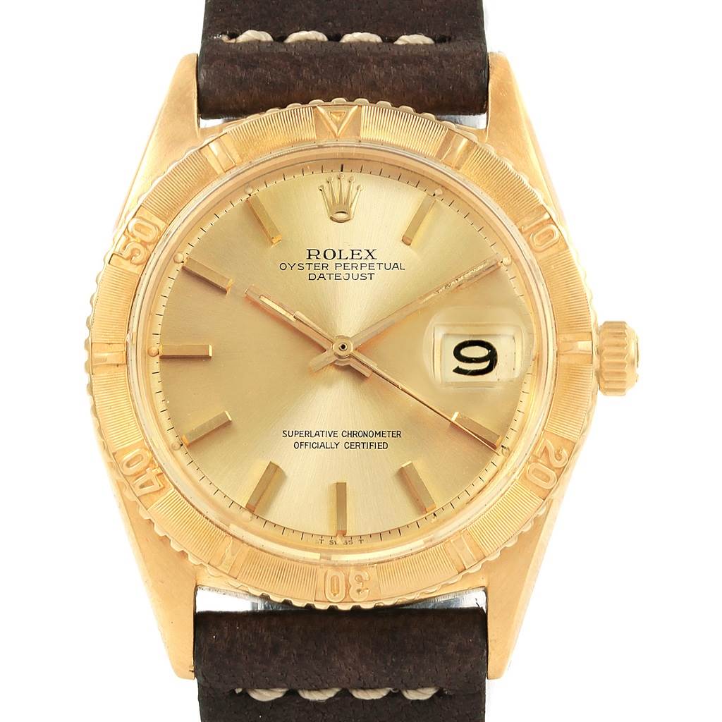 The Rolex Vintage Collection 1625 Men's Yellow Gold Champagne Dial 1625 Men's Yellow Gold Champagne Dial model is shown from the front, highlighting its gold case, dial, indices, and brown leather strap.