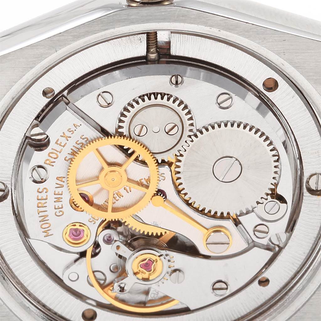The image shows a close-up view of the intricate internal mechanical movement of the Rolex Vintage Collection 6694 Men
s Stainless Steel Silver Dial 6694 Men
s Stainless Steel Silver Dial model.