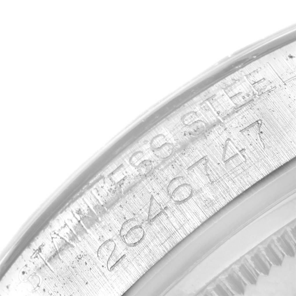 The image shows a close-up of the serial number engraved on the case of the Rolex Vintage Collection 6694 Men
s Stainless Steel Silver Dial 6694 Men
s Stainless Steel Silver Dial watch.