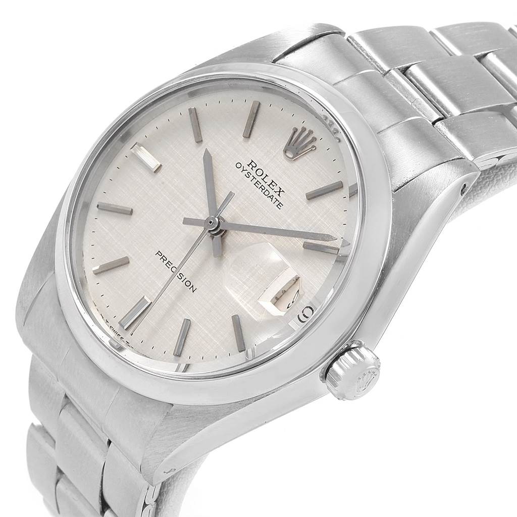 The image shows the dial, bezel, crown, and part of the bracelet of the Vintage Collection Rolex Oysterdate watch at a slight angle.