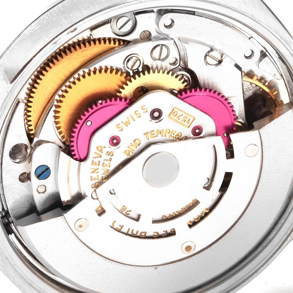 The image shows a close-up angle of the inner mechanical movement of the Rolex Vintage Collection 1500 Men
s Stainless Steel Silver Dial 1500 Men
s Stainless Steel Silver Dial watch.