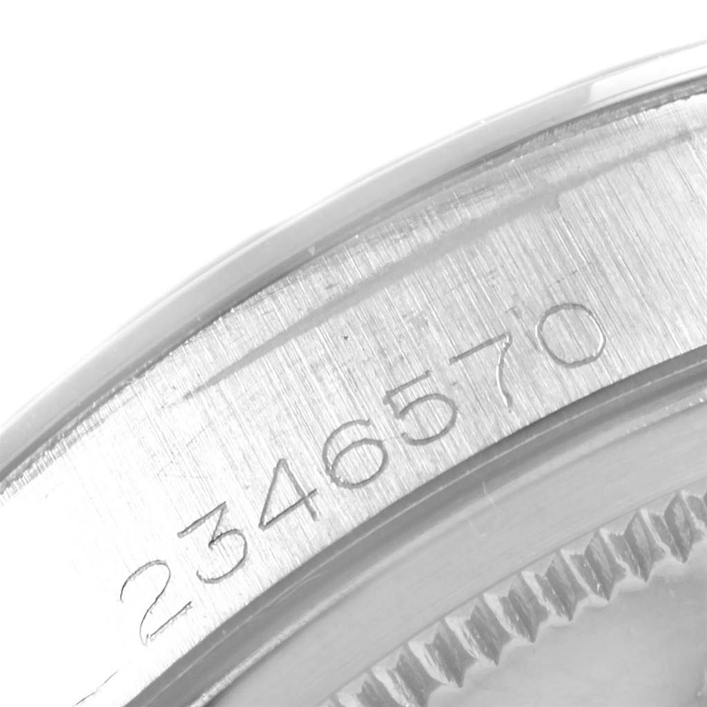 This close-up image shows the serial number engraved on the side of the Rolex Vintage Collection 1500 Men
s Stainless Steel Silver Dial 1500 Men
s Stainless Steel Silver Dial watch case.