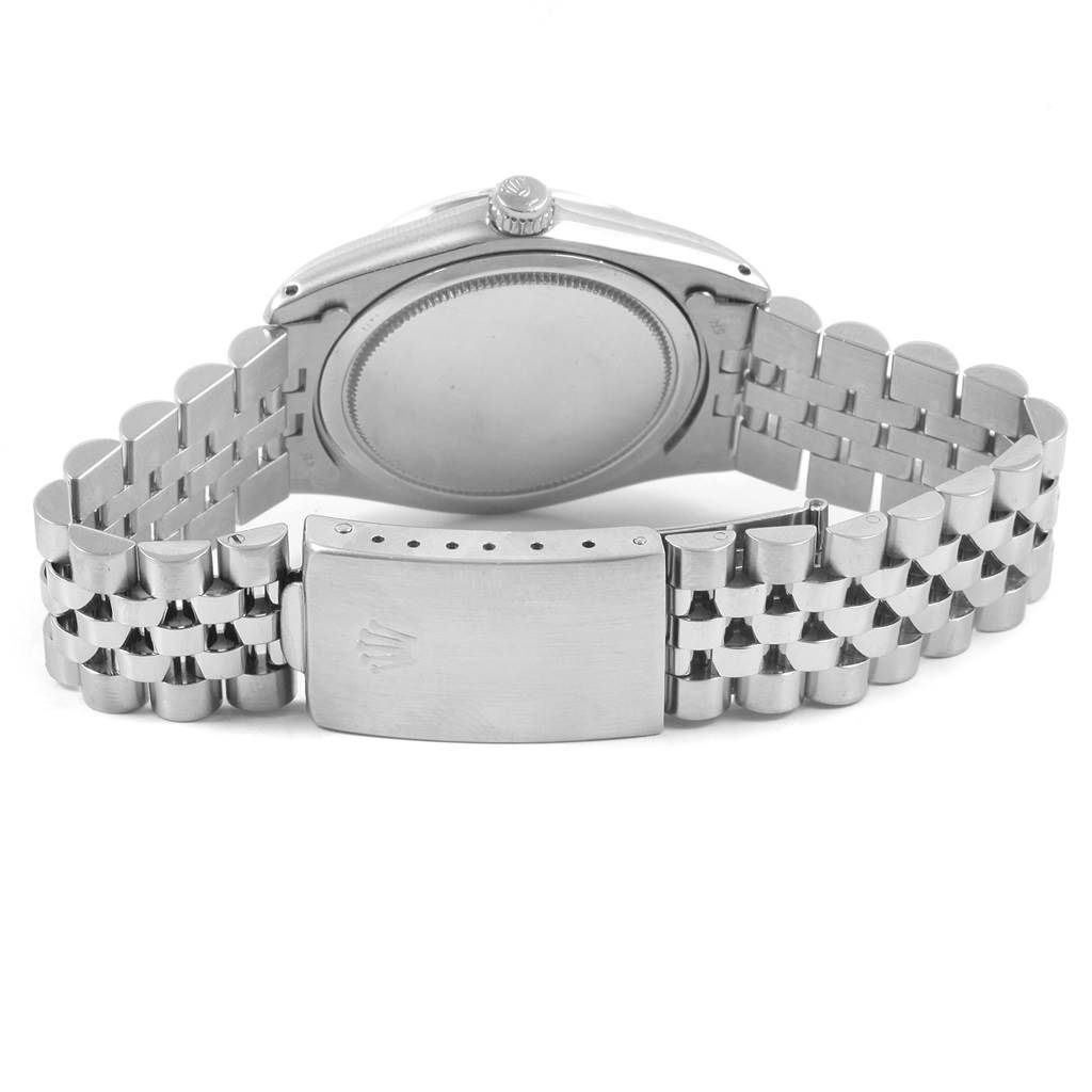 The image shows the back case and bracelet clasp of a Rolex Vintage Collection 6694 Men
s Stainless Steel Black Dial 6694 Men
s Stainless Steel Black Dial model watch from a rear angle.