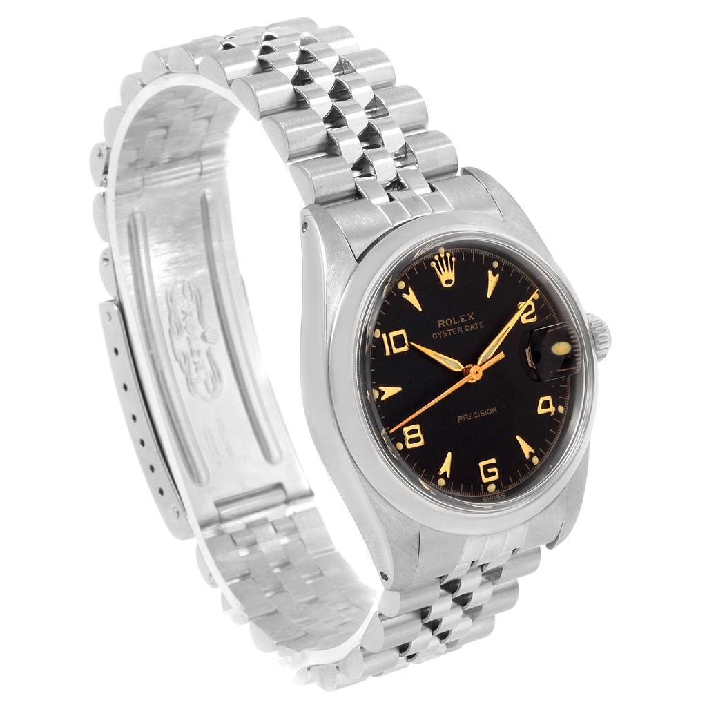 The image shows a Rolex Vintage Collection 6694 Men
s Stainless Steel Black Dial 6694 Men
s Stainless Steel Black Dial watch at an oblique angle, highlighting its face, crown, and stainless steel bracelet.