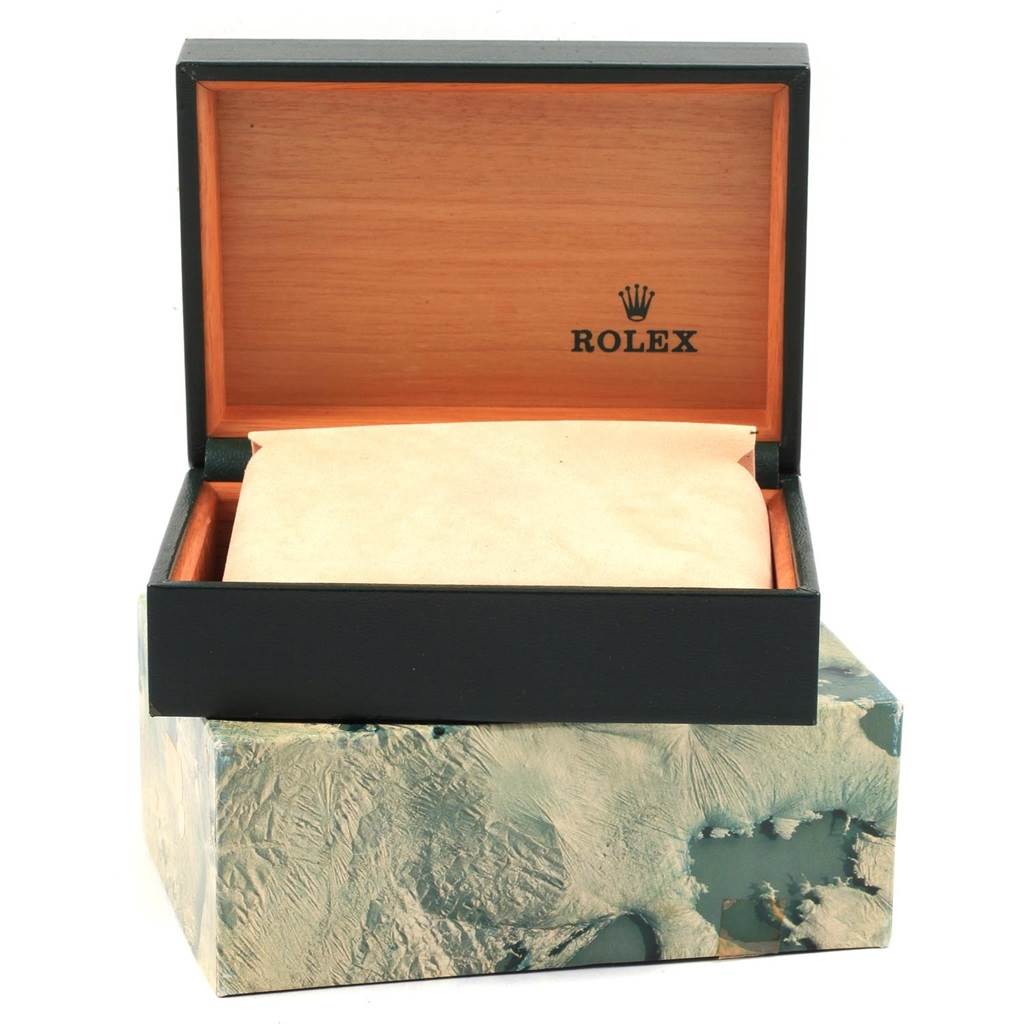 The image shows an open Rolex watch box for the Vintage Collection model, displaying its interior with a cushion.