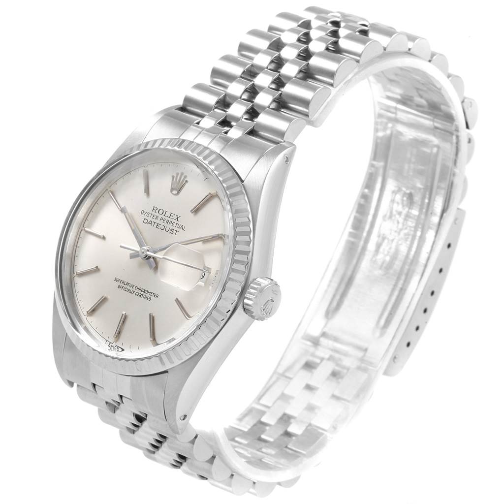 The image shows a side and front angle of the Rolex Vintage Collection 16014 Men's Stainless Steel Silver Dial 16014 Men's Stainless Steel Silver Dial's Oyster Perpetual Datejust watch with a silver dial and Jubilee bracelet.