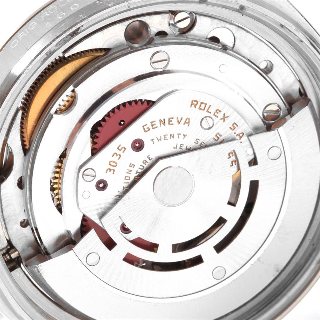 This image shows a detailed view of the inner mechanical movement of the Rolex Vintage Collection 16014 Men's Stainless Steel Silver Dial 16014 Men's Stainless Steel Silver Dial model watch, focusing on its gears and inscriptions.