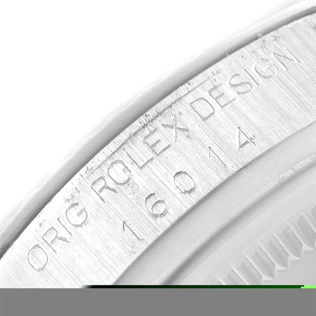 This close-up image shows the side engraving on the bezel of a Rolex Vintage Collection 16014 Men's Stainless Steel Silver Dial 16014 Men's Stainless Steel Silver Dial model, emphasizing the "ORG ROLEX DESIGN" text and model number.