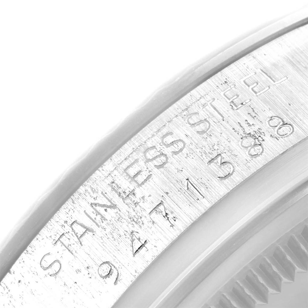 This image shows a close-up of the case back and serial number of the Rolex Vintage Collection 16014 Men's Stainless Steel Silver Dial 16014 Men's Stainless Steel Silver Dial model.