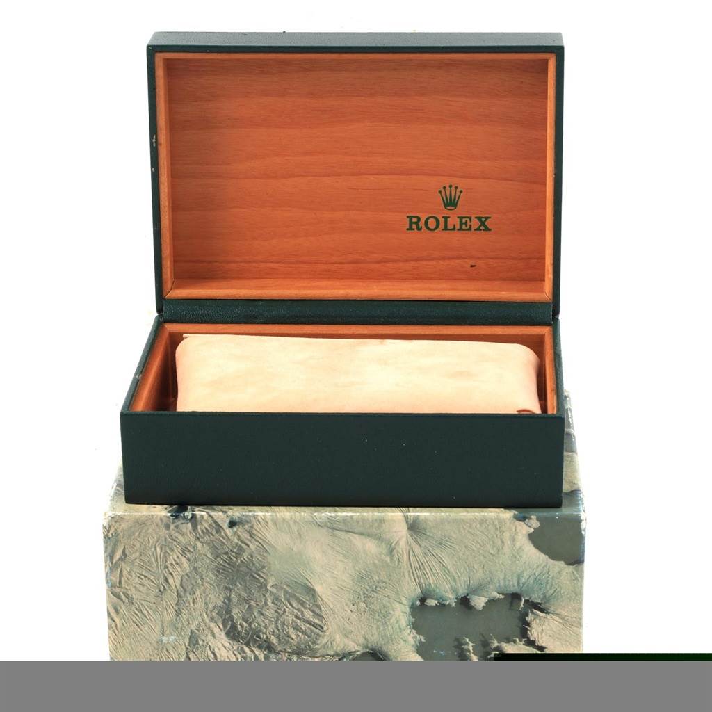 A Rolex Vintage Collection 16014 Men's Stainless Steel Silver Dial 16014 Men's Stainless Steel Silver Dial box is shown, open, with a beige cushion inside.