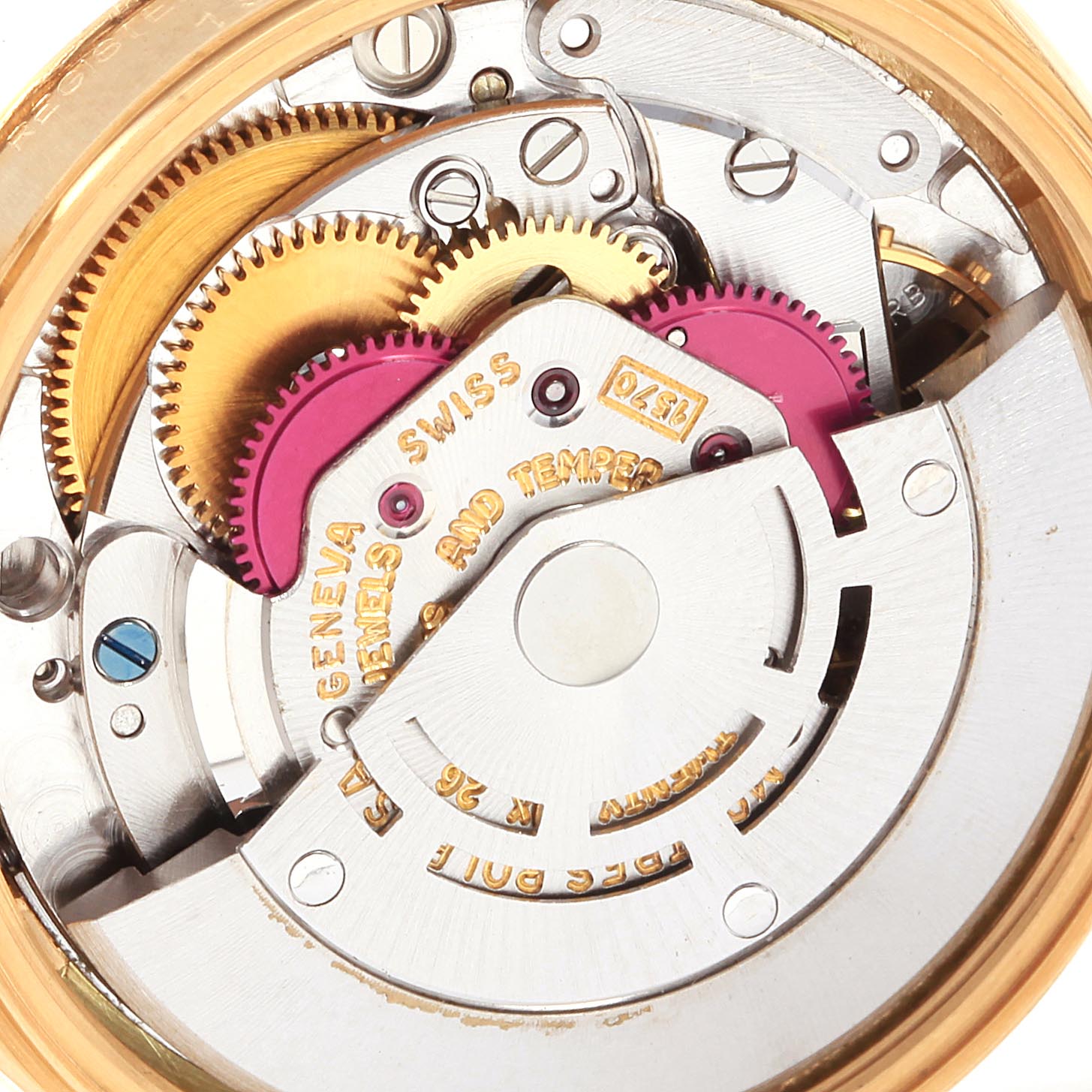 The image shows the internal mechanism of a Rolex Vintage Collection 1500 Men
s Yellow Gold Champagne Dial 1500 Men
s Yellow Gold Champagne Dial watch, highlighting gears and intricate components.