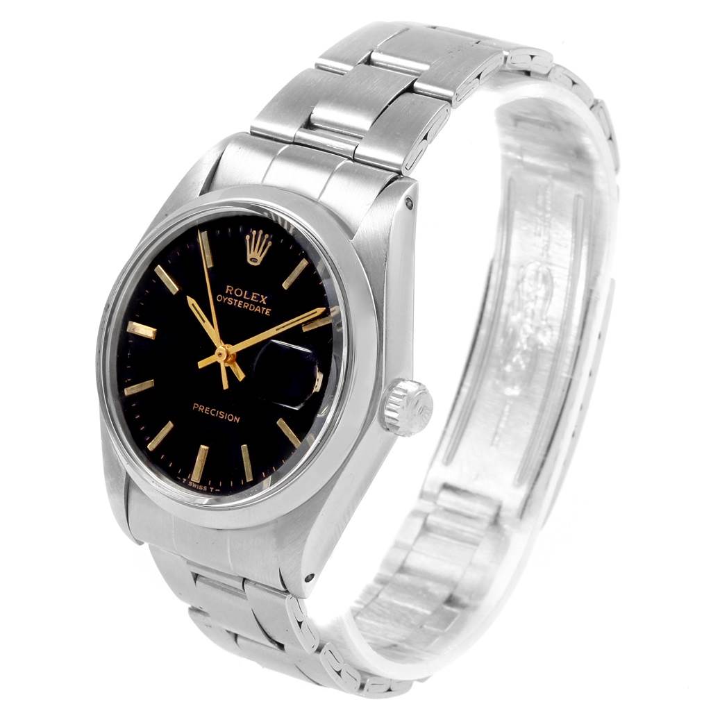 This Vintage Collection Rolex Oysterdate watch is shown in a three-quarter angle highlighting the face, bezel, crown, and bracelet.