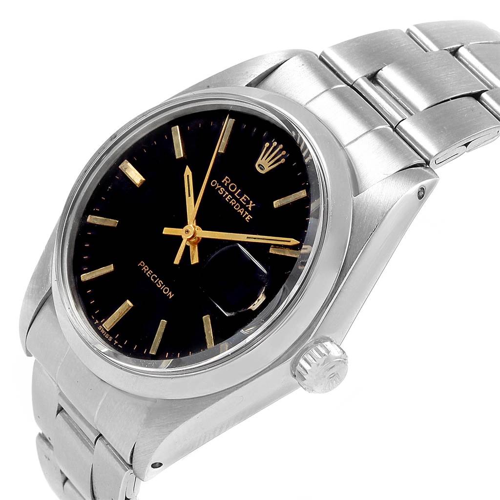 This image shows a Rolex Vintage Collection 6694 Men's Stainless Steel Black Dial 6694 Men's Stainless Steel Black Dial Oysterdate watch at an angle displaying the dial, crown, and stainless steel bracelet.
