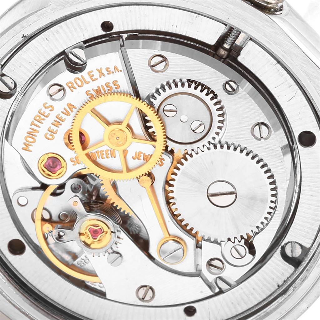 This image shows the internal mechanical movement with gears and components of a Vintage Collection model by Rolex.
