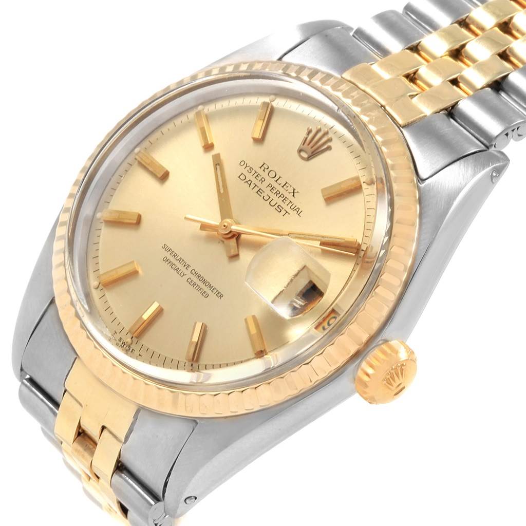 This image shows a close-up of the face, dial, crown, and part of the bracelet of the Rolex Vintage Collection 1601 Men
s Steel and Gold (two tone) Champagne Dial 1601 Men
s Steel and Gold (two tone) Champagne Dial Datejust watch.