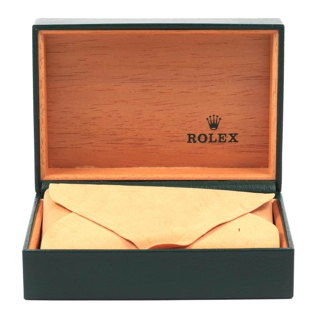 The image shows an open Rolex watch box from the Vintage Collection model, displaying its interior and the protective cover.