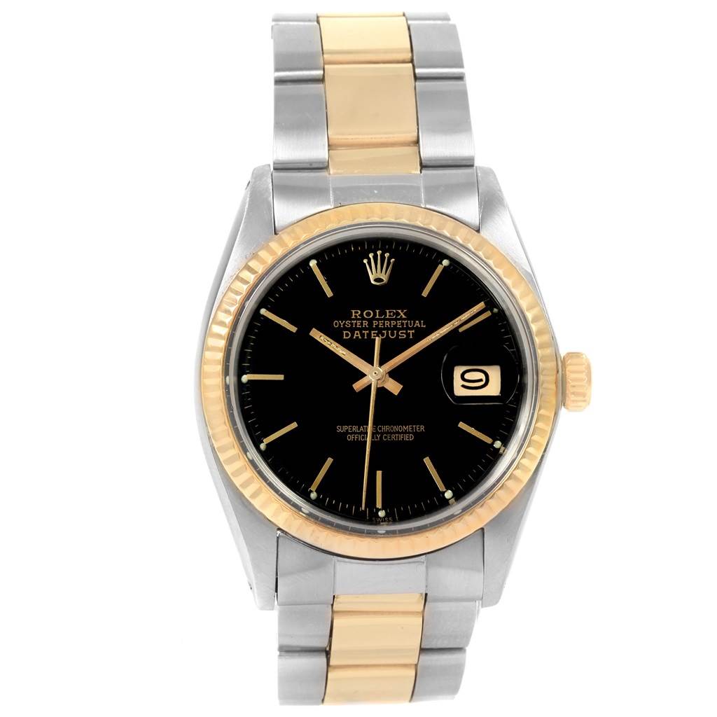 The image shows a frontal view of the Rolex Vintage Collection 1601 Men's Steel and Gold (two tone) Black Dial 1601 Men's Steel and Gold (two tone) Black Dial watch, highlighting its bezel, dial, crown, and bracelet.