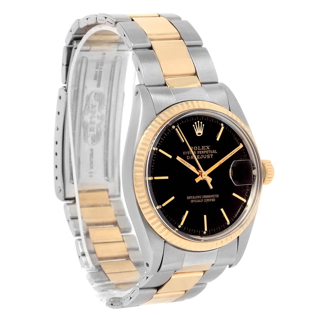 The Rolex Vintage Collection 1601 Men's Steel and Gold (two tone) Black Dial 1601 Men's Steel and Gold (two tone) Black Dial model is shown from a front angle, displaying its two-tone bracelet, dial, bezel, and crown.