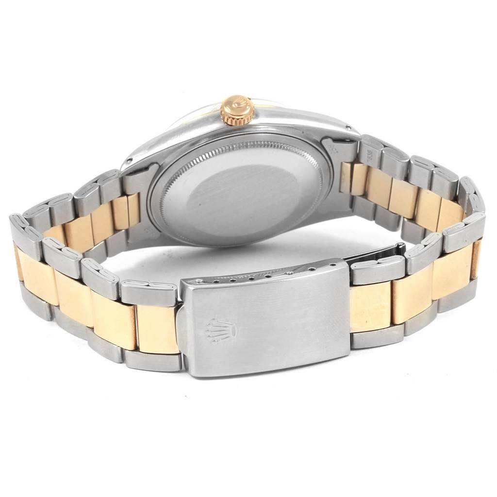 This image shows the back and side of the Rolex Vintage Collection 1601 Men's Steel and Gold (two tone) Black Dial 1601 Men's Steel and Gold (two tone) Black Dial watch, displaying the bracelet, case back, and clasp.